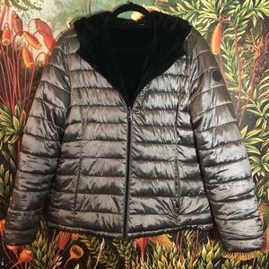 Shiny silver jacket with soft black interior